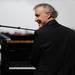 Musician Bruce Hornsby smiles as he performs on stage at the start of the Mercedes-Benz press presentation at the North American International Auto Show during the press preview on Monday, Jan. 14, at Cobo Center in Detroit.   Melanie Maxwell I AnnArbor.com 